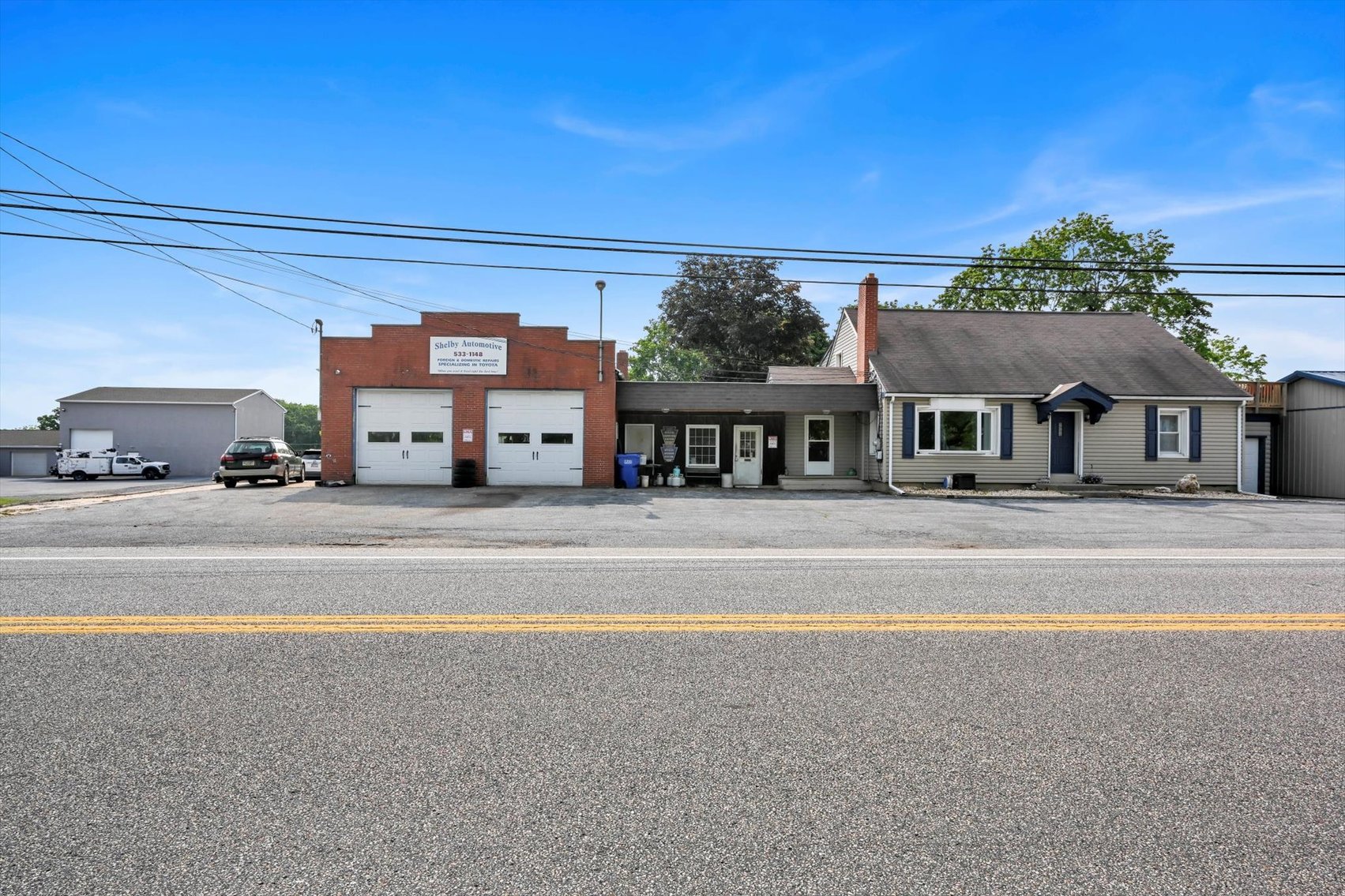 Image for Online Real Estate Auction - Cape Cod Style House with Auto Body Garage on 2+ Acres