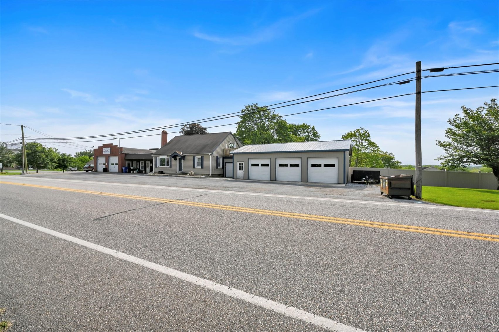 Image for Online Real Estate Auction - Cape Cod Style House with Auto Body Garage on 2+ Acres