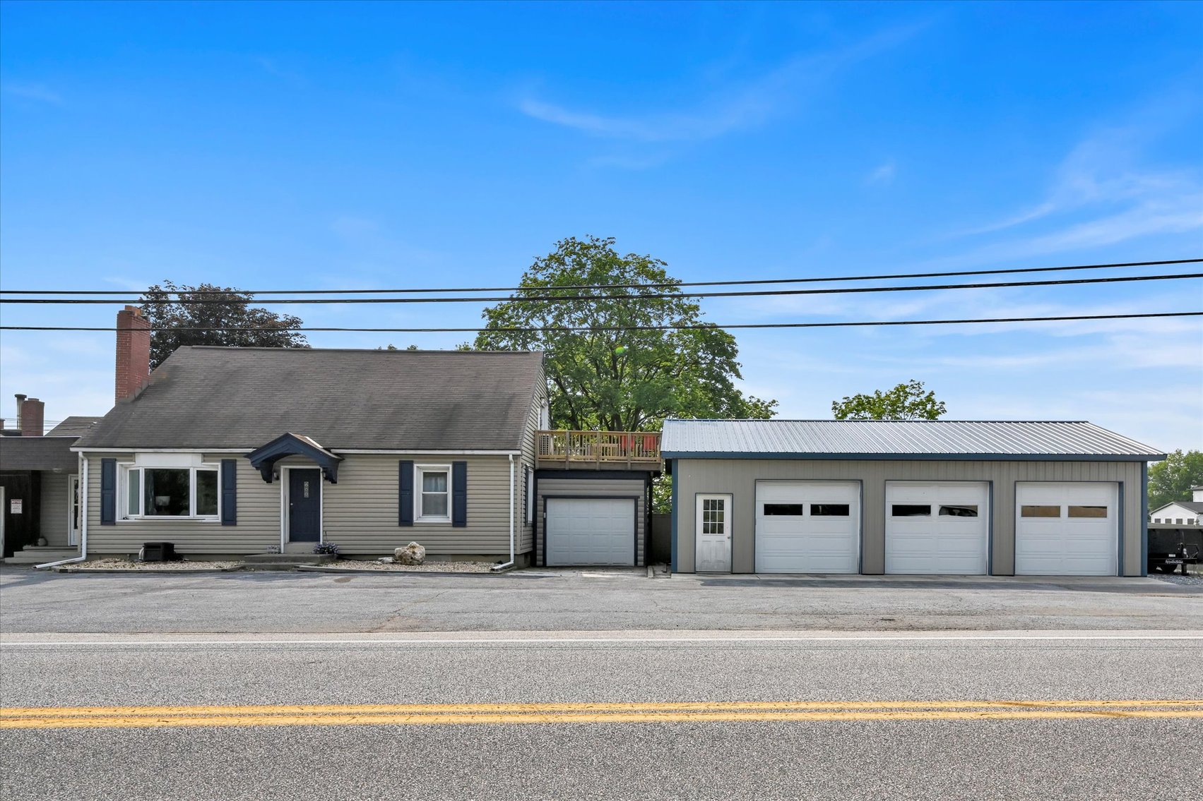 Image for Online Real Estate Auction - Cape Cod Style House with Auto Body Garage on 2+ Acres