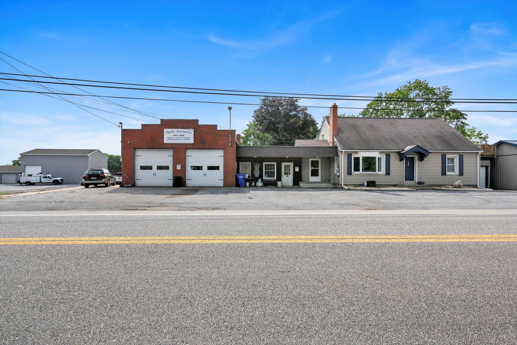 Image for Online Real Estate Auction - Cape Cod Style House with Auto Body Garage on 2+ Acres