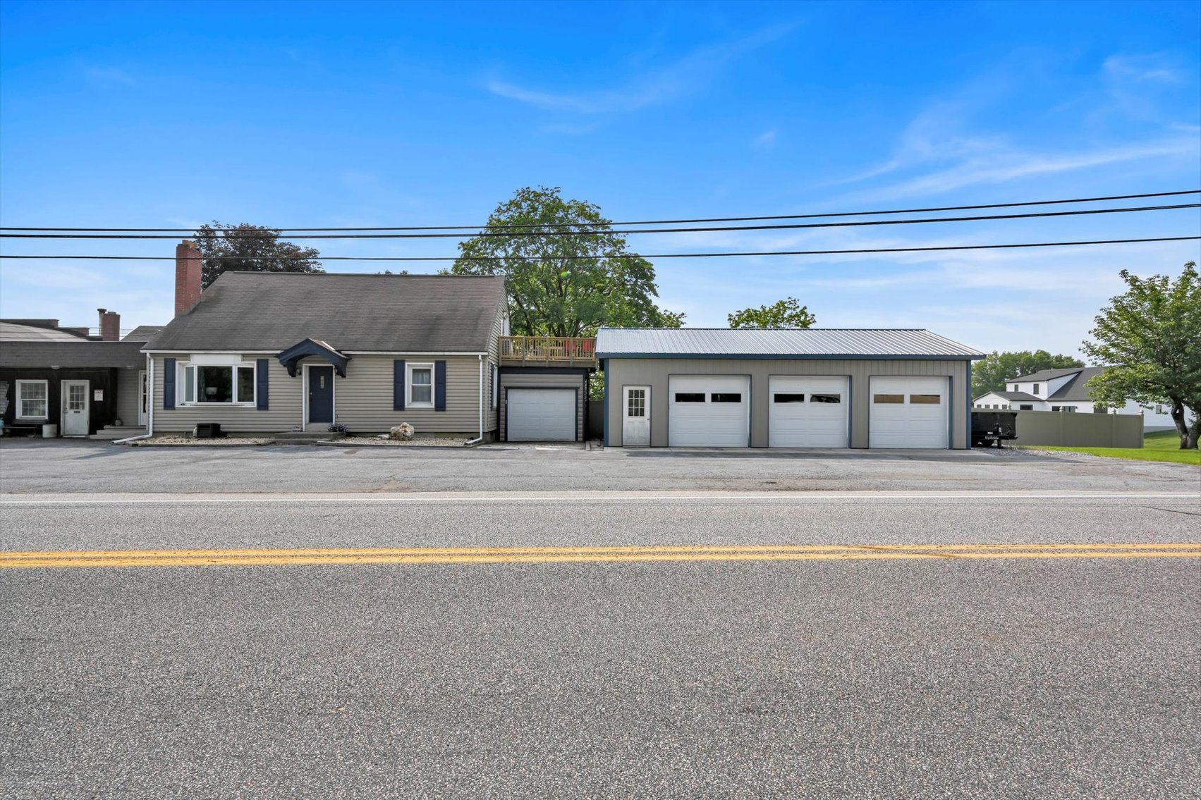Image for Online Real Estate Auction - Cape Cod Style House with Auto Body Garage on 2+ Acres