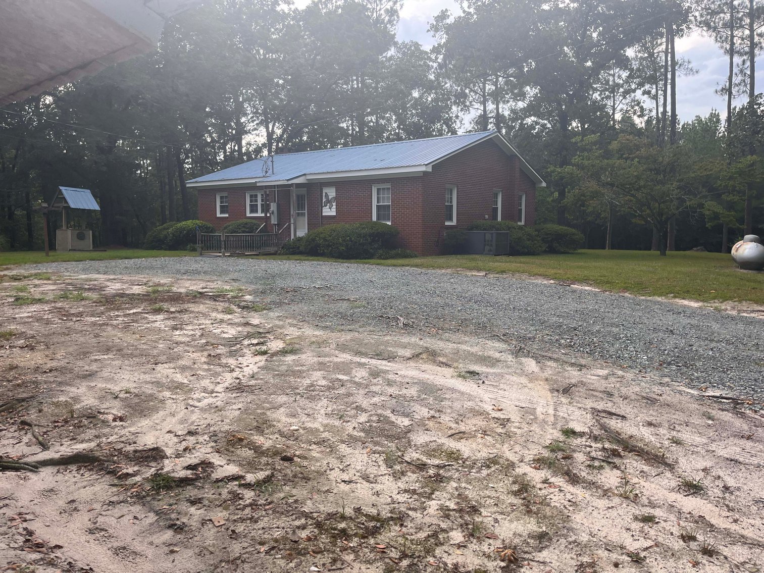 Image for 43 acres in Harnett County with a brick home in an onsite live /online / simulcast auction event!