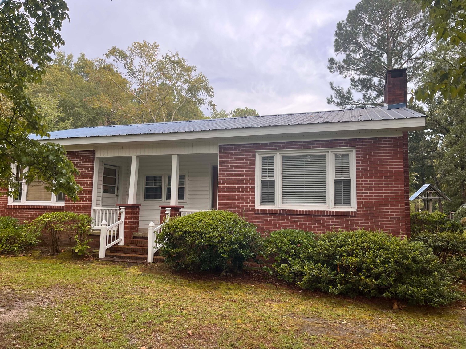 Image for 43 acres in Harnett County with a brick home in an onsite live /online / simulcast auction event!