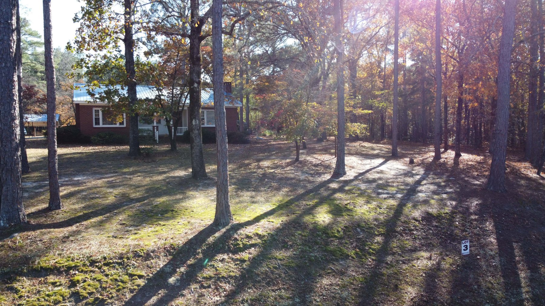 Image for 43 acres in Harnett County with a brick home in an onsite live /online / simulcast auction event!