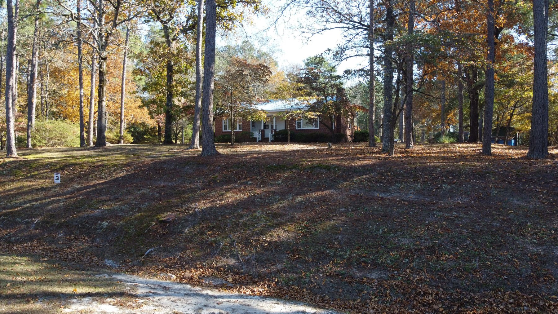 Image for 43 acres in Harnett County with a brick home in an onsite live /online / simulcast auction event!