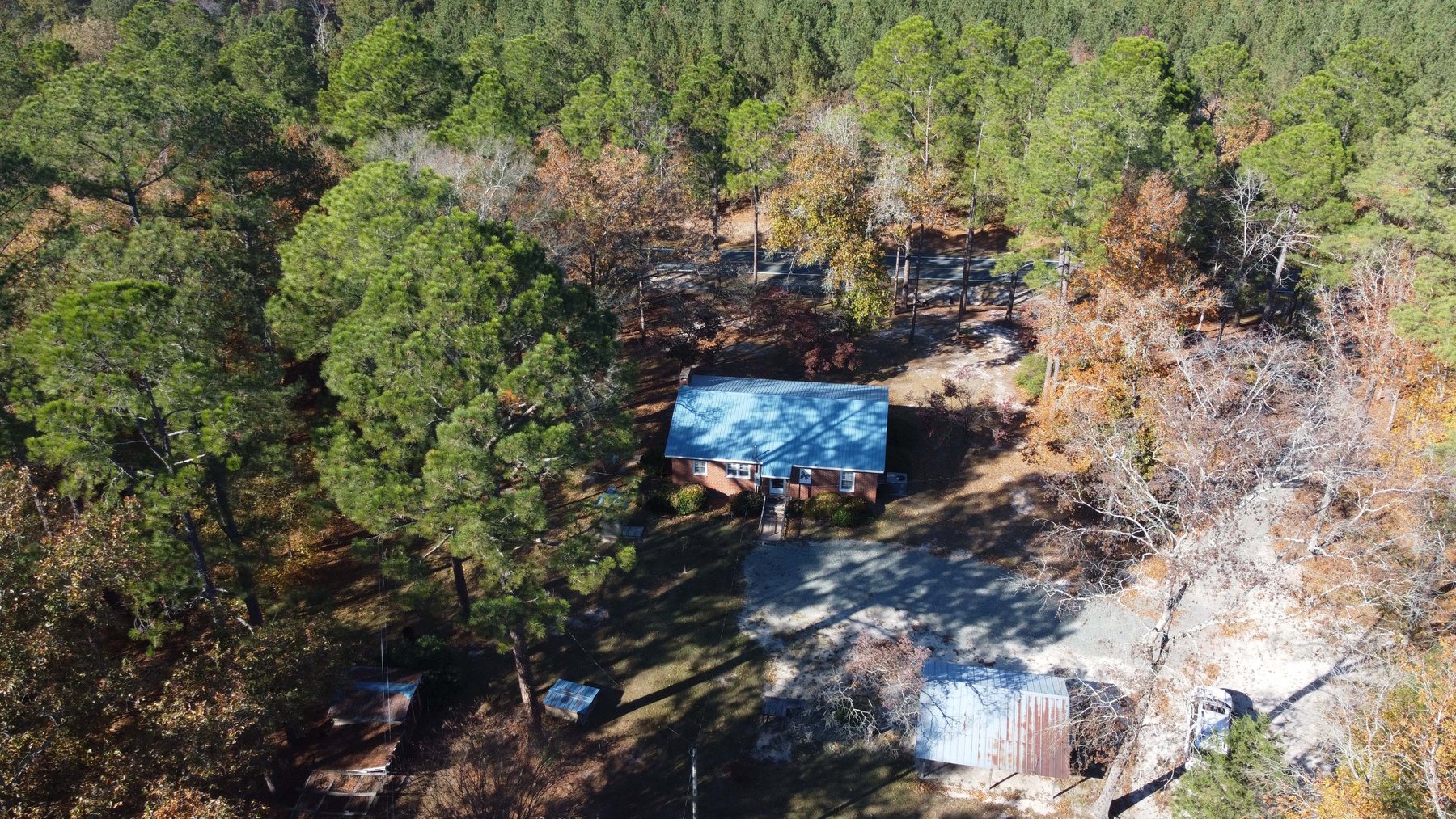 Image for 43 acres in Harnett County with a brick home in an onsite live /online / simulcast auction event!