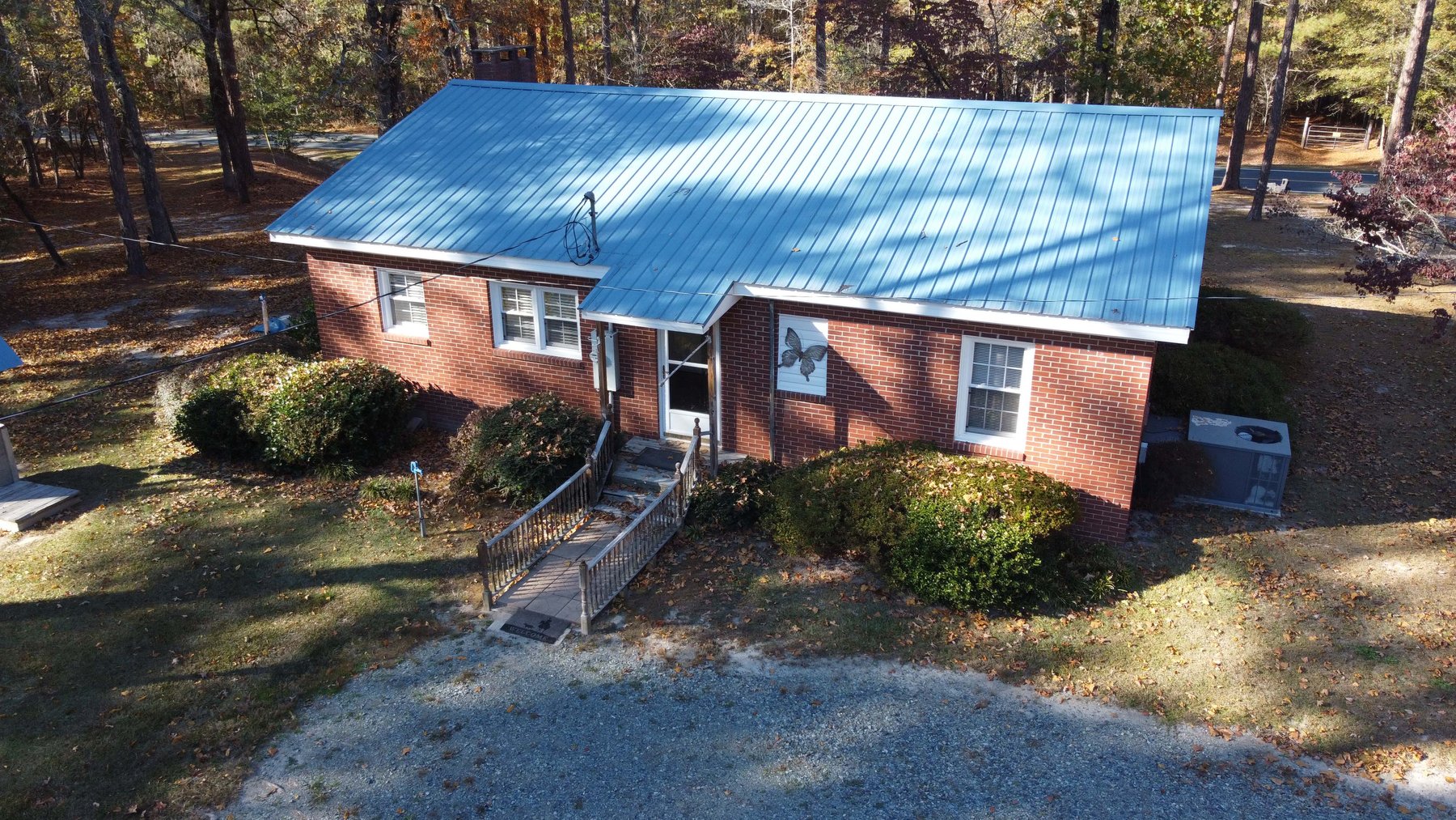 Image for 43 acres in Harnett County with a brick home in an onsite live /online / simulcast auction event!