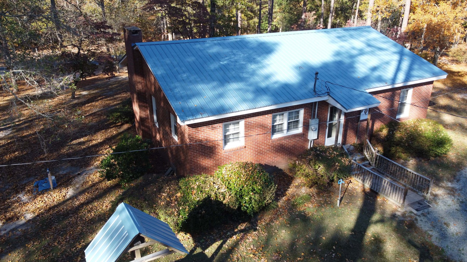 Image for 43 acres in Harnett County with a brick home in an onsite live /online / simulcast auction event!