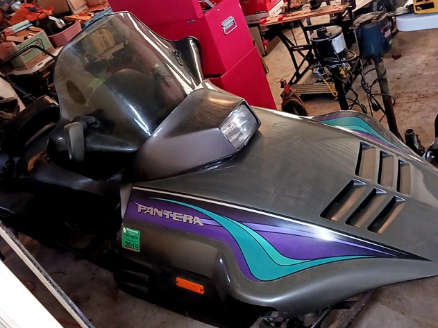 Image for #74-Snowmobiles, Boat, ATV, Tools, Chicken Collectibles Estate Online Auction