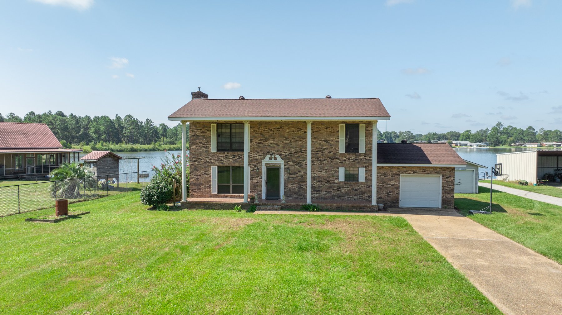 Image for Indian Lake Retreat - Waterfront Colonial Brick Home in Colquitt County, Georgia