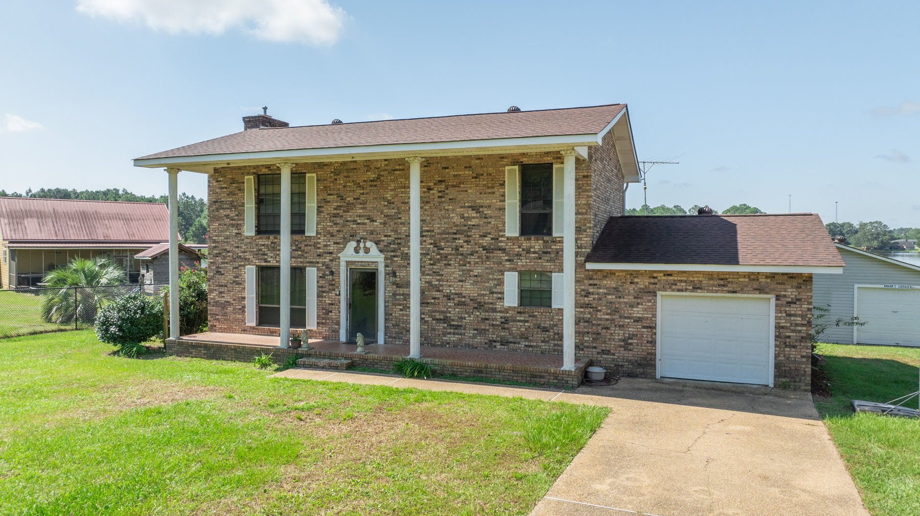 Image for Indian Lake Retreat - Waterfront Colonial Brick Home in Colquitt County, Georgia