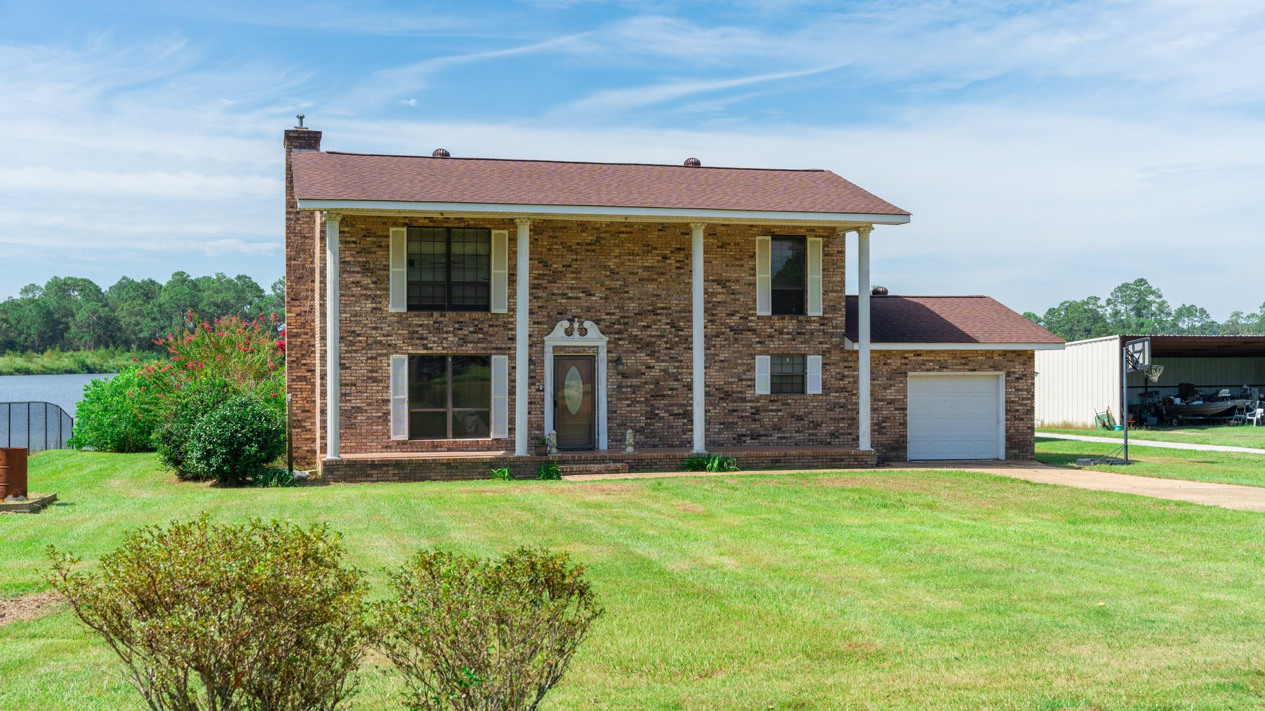 Image for Indian Lake Retreat - Waterfront Colonial Brick Home in Colquitt County, Georgia