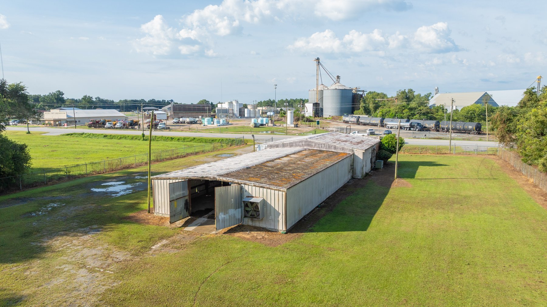Image for 1.98+/- Acre Commercial Property with Versatile 4,887+/- Sq Ft Shop with Office and 1000+/- Sq Ft Open-Air Barn