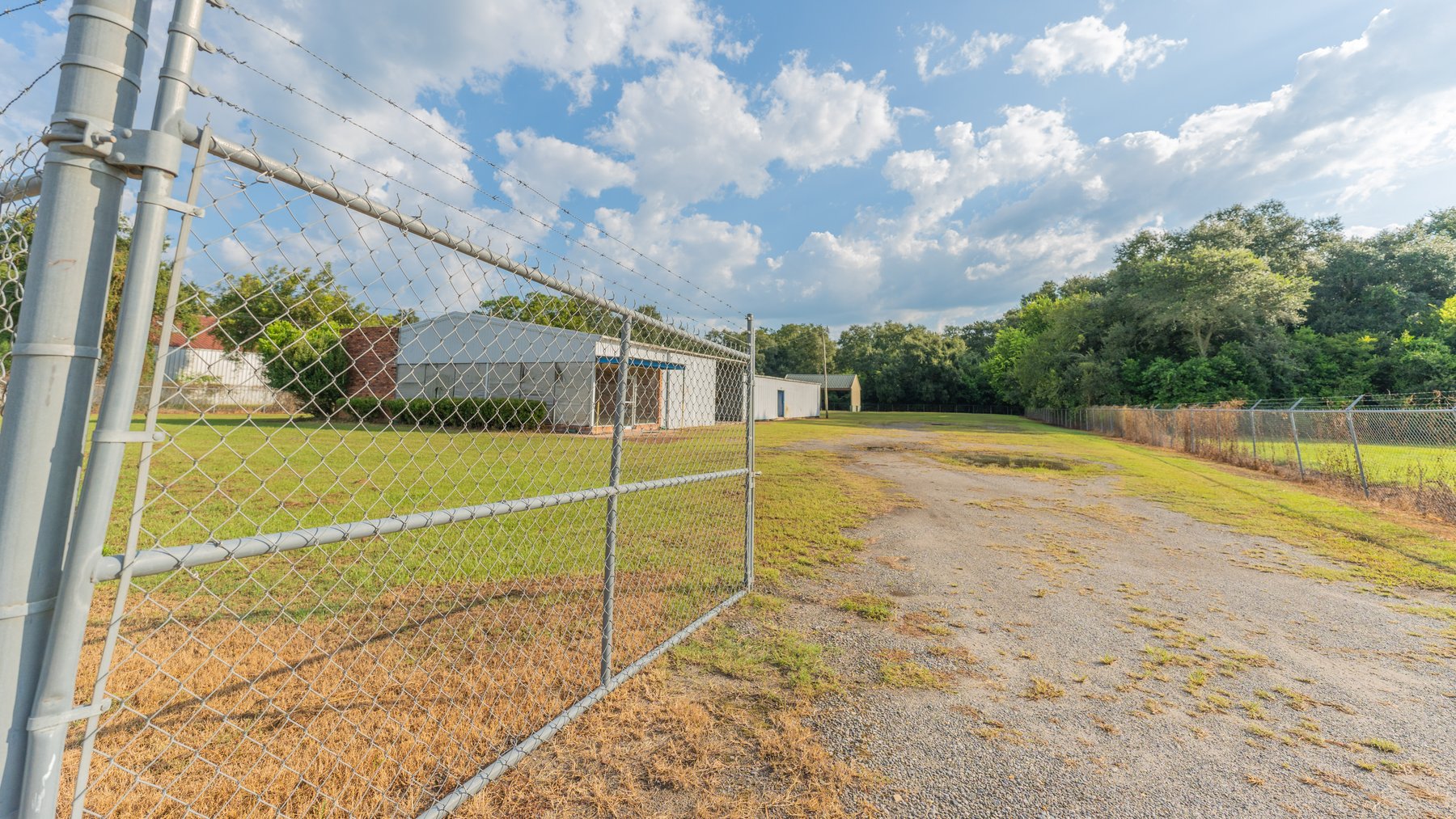 Image for 1.98+/- Acre Commercial Property with Versatile 4,887+/- Sq Ft Shop with Office and 1000+/- Sq Ft Open-Air Barn