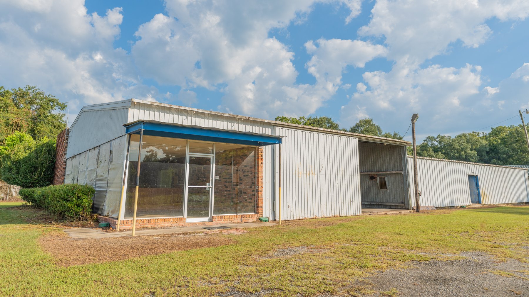 Image for 1.98+/- Acre Commercial Property with Versatile 4,887+/- Sq Ft Shop with Office and 1000+/- Sq Ft Open-Air Barn