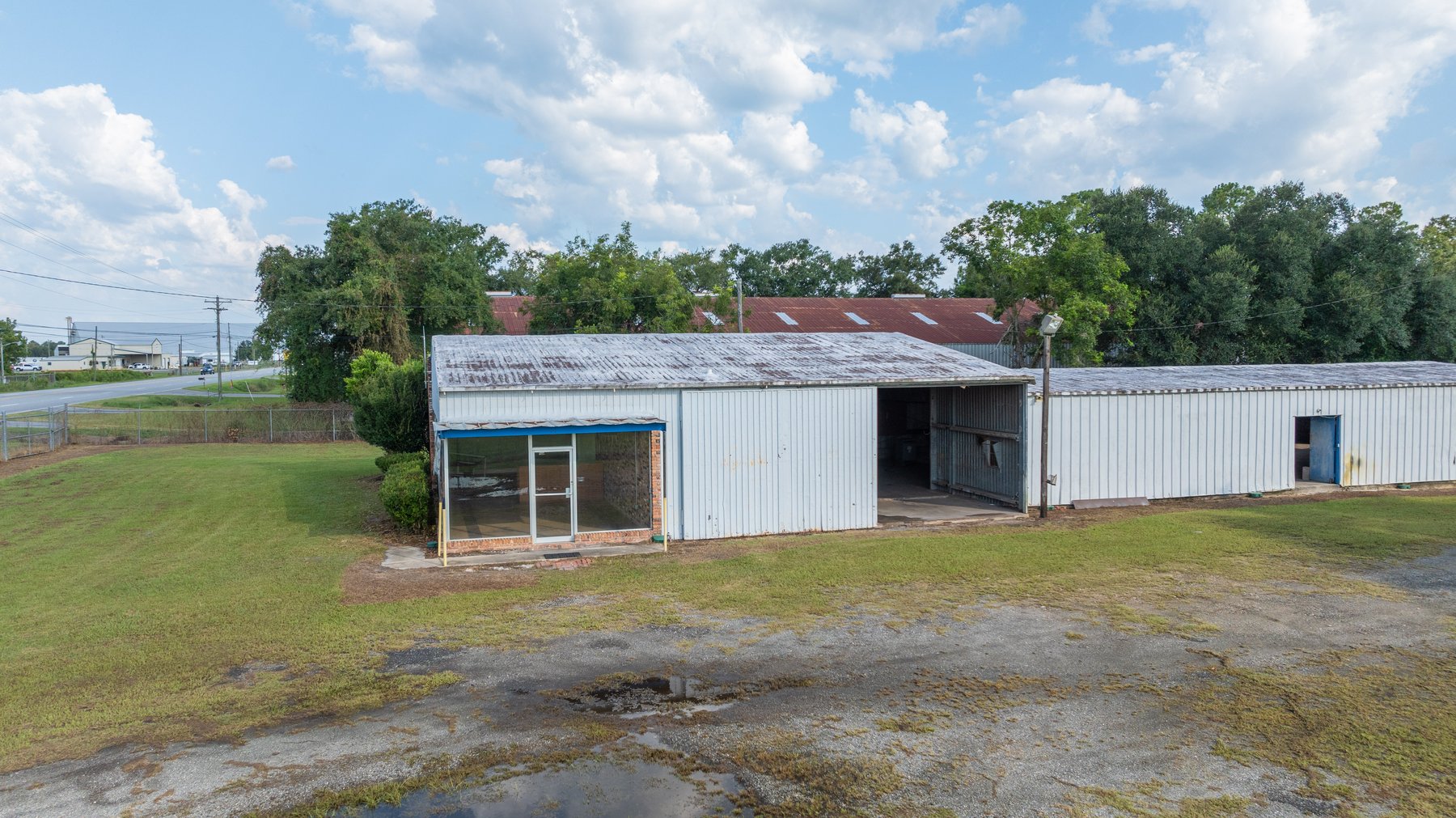 Image for 1.98+/- Acre Commercial Property with Versatile 4,887+/- Sq Ft Shop with Office and 1000+/- Sq Ft Open-Air Barn