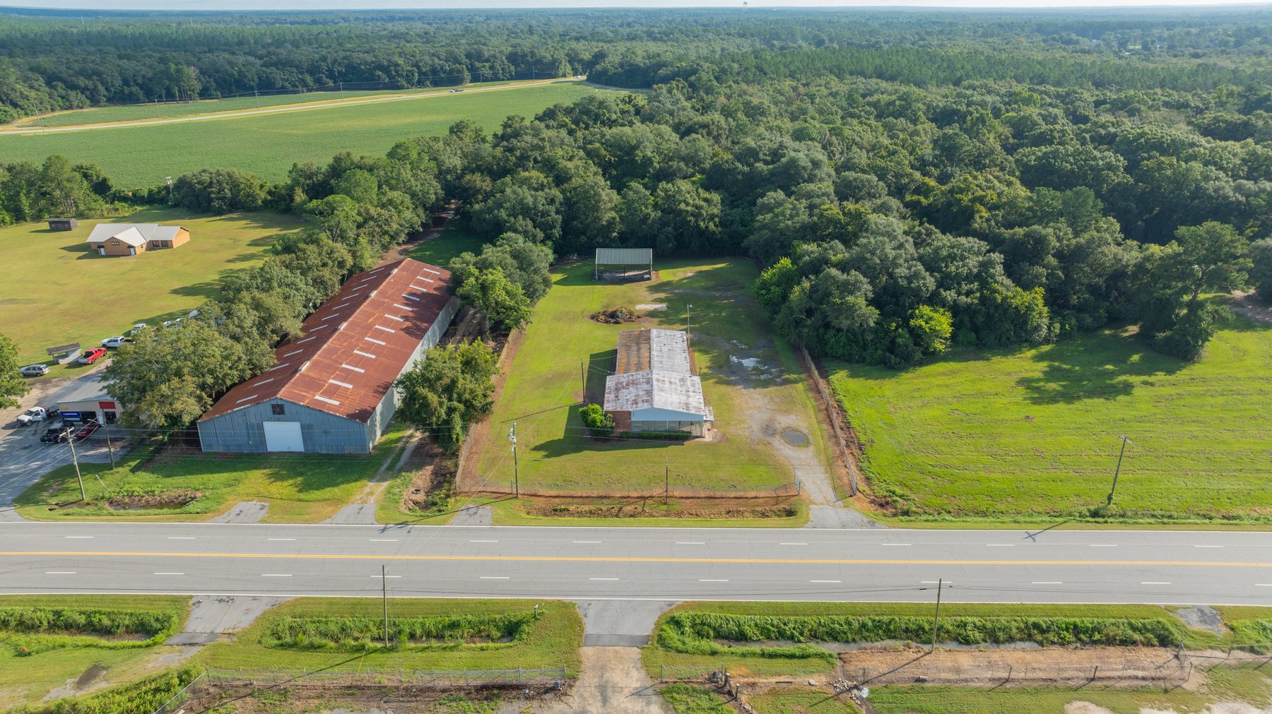 Image for 1.98+/- Acre Commercial Property with Versatile 4,887+/- Sq Ft Shop with Office and 1000+/- Sq Ft Open-Air Barn