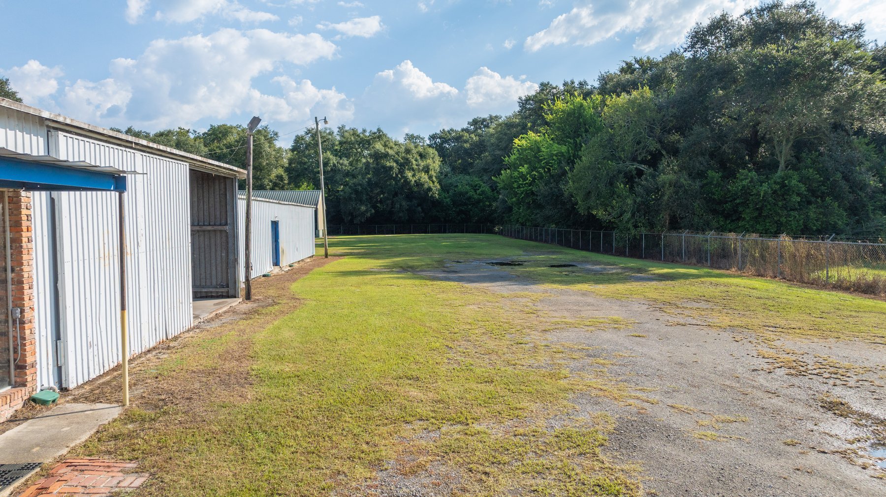 Image for 1.98+/- Acre Commercial Property with Versatile 4,887+/- Sq Ft Shop with Office and 1000+/- Sq Ft Open-Air Barn