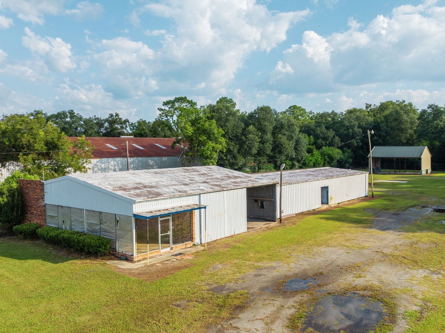 Image for 1.98+/- Acre Commercial Property with Versatile 4,887+/- Sq Ft Shop with Office and 1000+/- Sq Ft Open-Air Barn