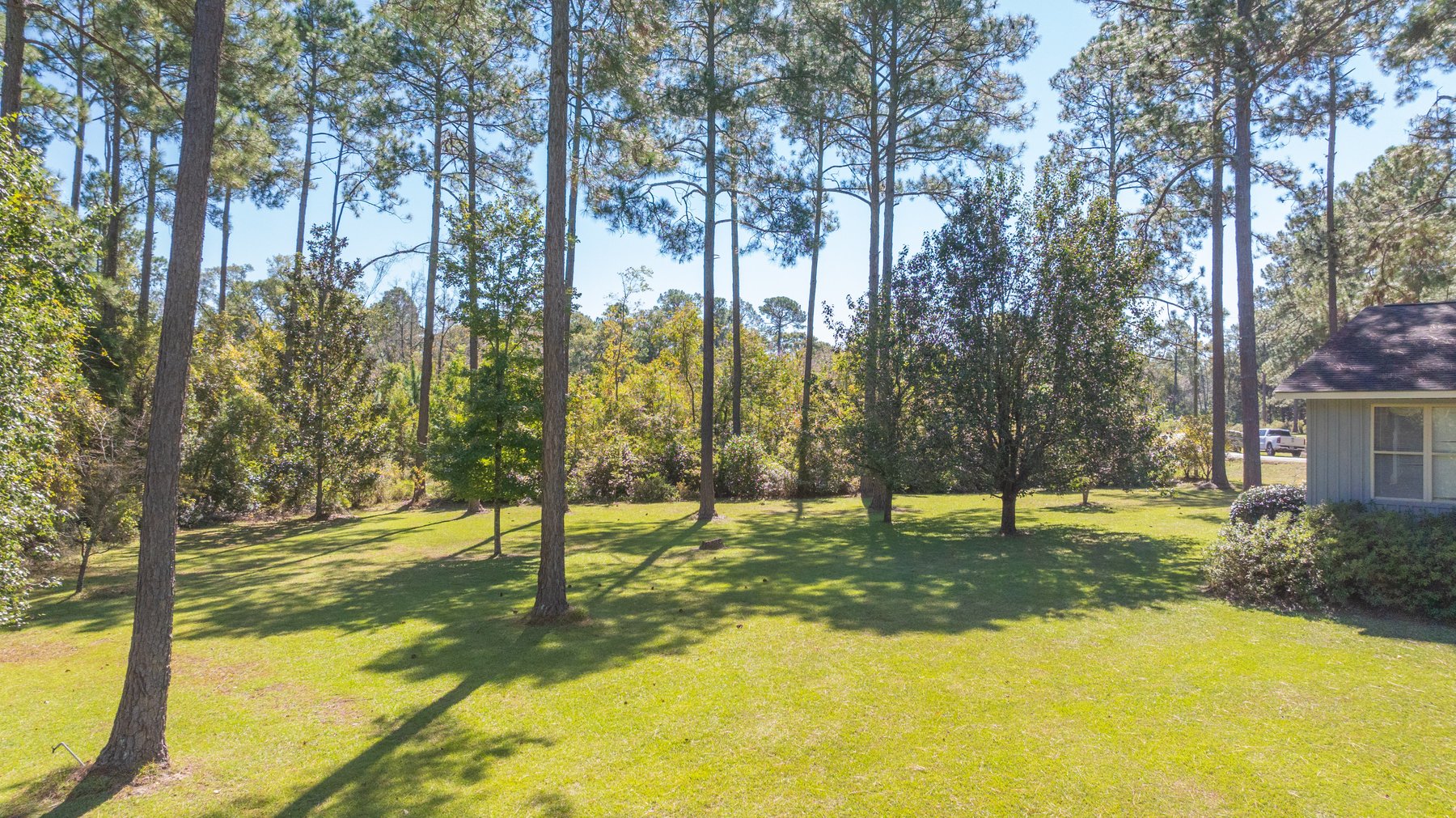 Image for Carolyn A. Peace Living Estate - Beautiful Stone-Faced Wood-Siding Ranch-Style Home
