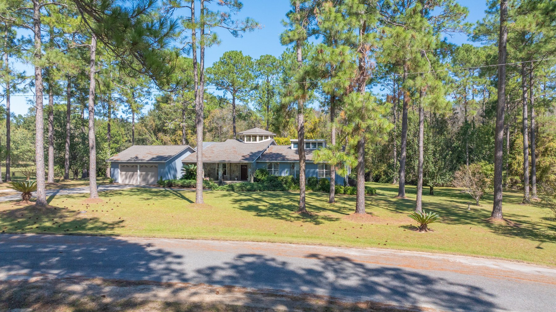 Image for Carolyn A. Peace Living Estate - Beautiful Stone-Faced Wood-Siding Ranch-Style Home
