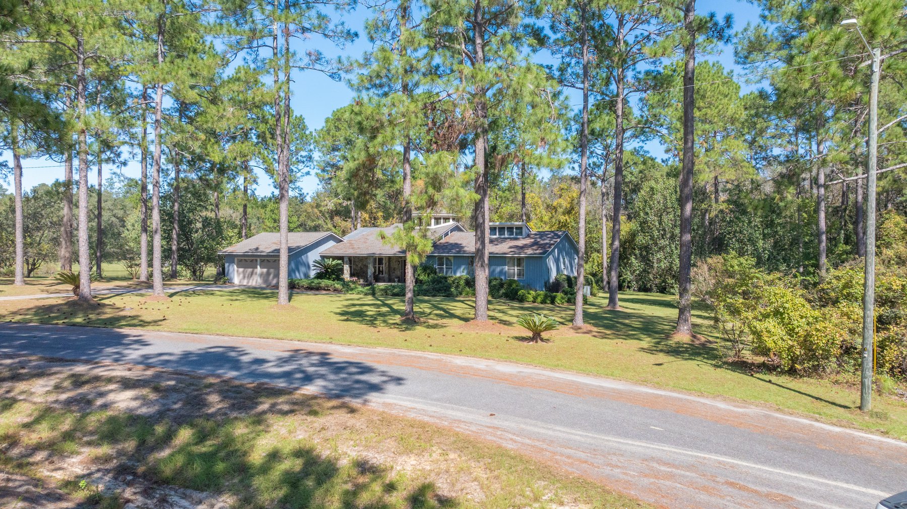 Image for Carolyn A. Peace Living Estate - Beautiful Stone-Faced Wood-Siding Ranch-Style Home