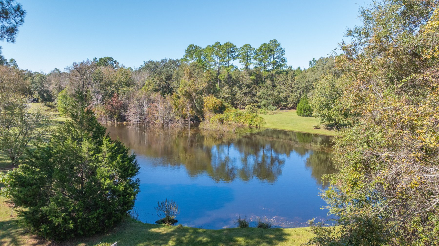 Image for Carolyn A. Peace Living Estate - Beautiful Stone-Faced Wood-Siding Ranch-Style Home
