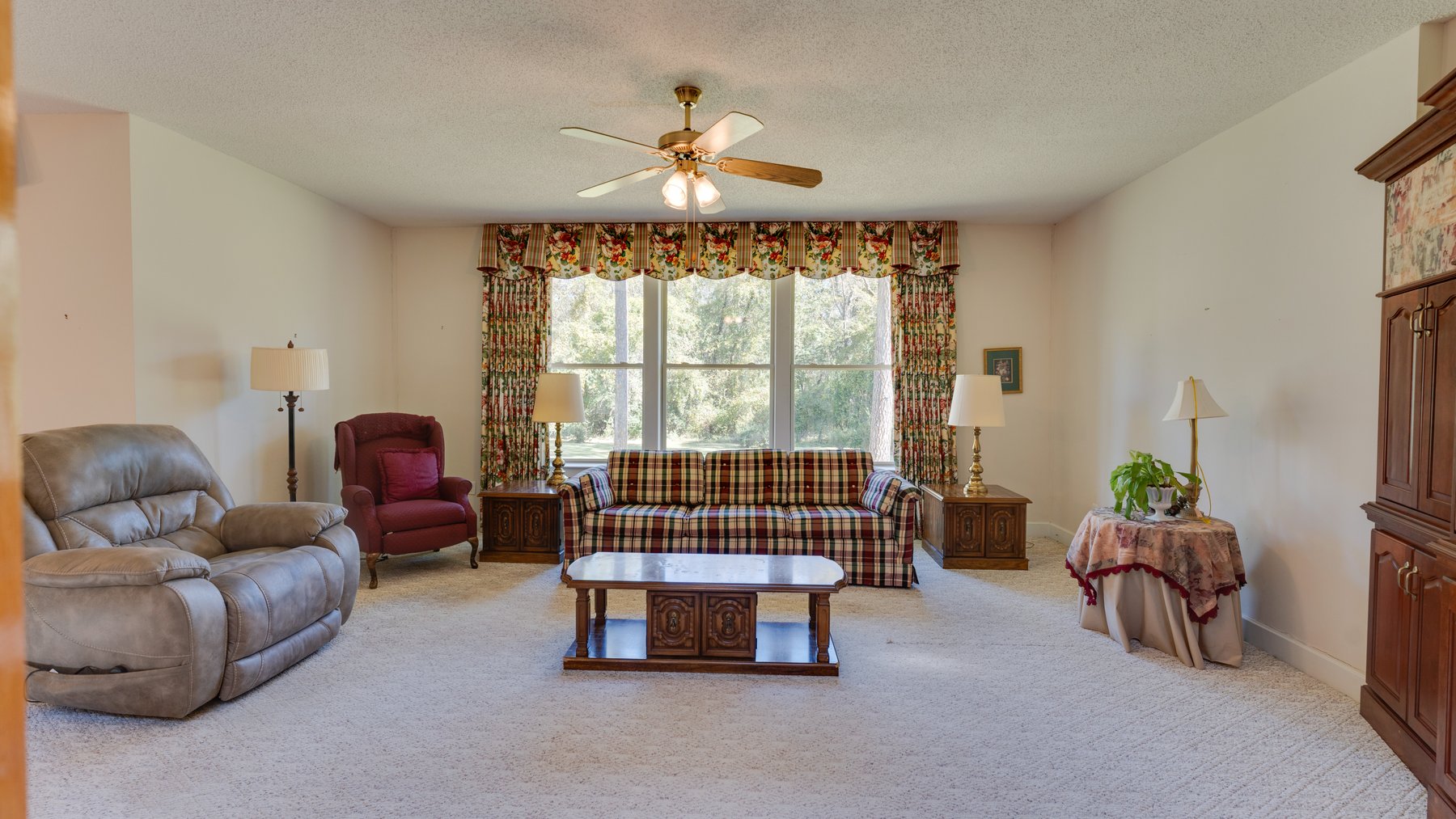 Image for Carolyn A. Peace Living Estate - Beautiful Stone-Faced Wood-Siding Ranch-Style Home