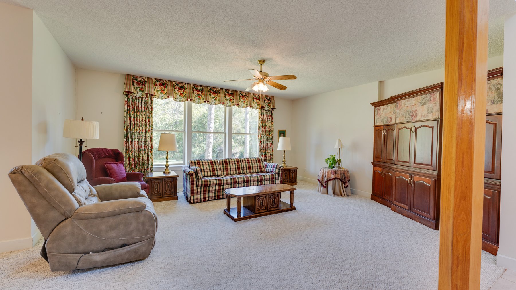 Image for Carolyn A. Peace Living Estate - Beautiful Stone-Faced Wood-Siding Ranch-Style Home