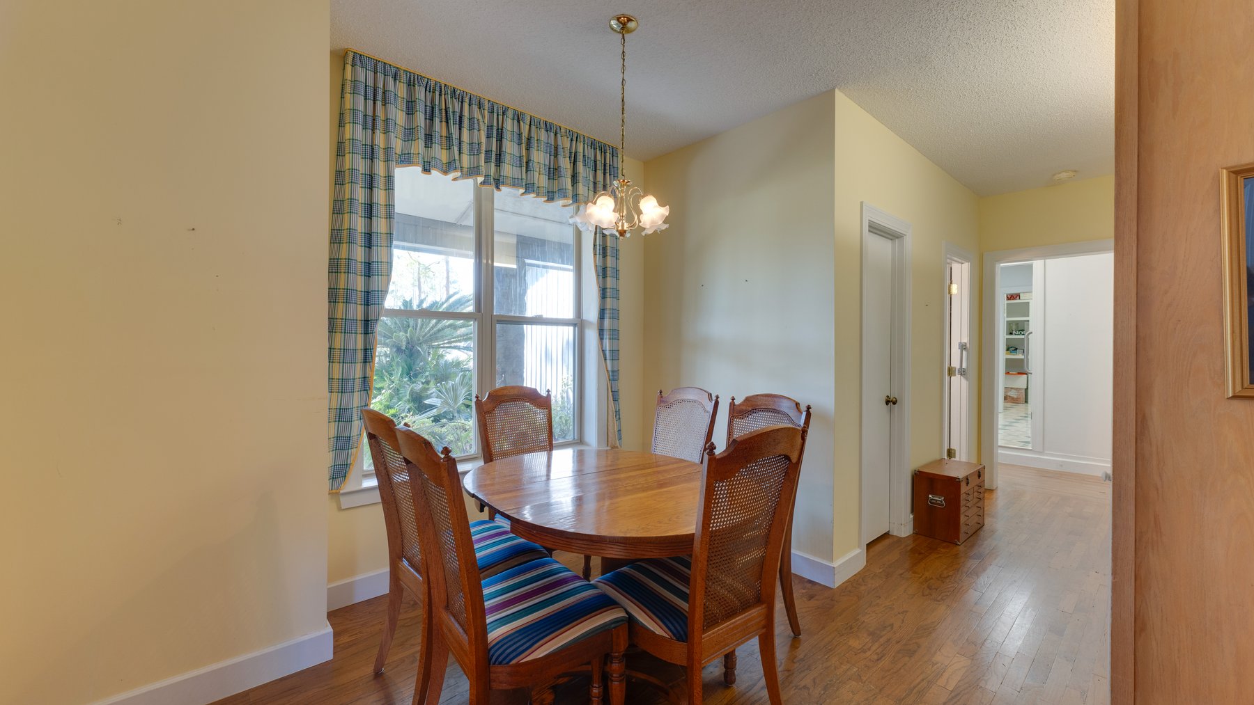 Image for Carolyn A. Peace Living Estate - Beautiful Stone-Faced Wood-Siding Ranch-Style Home