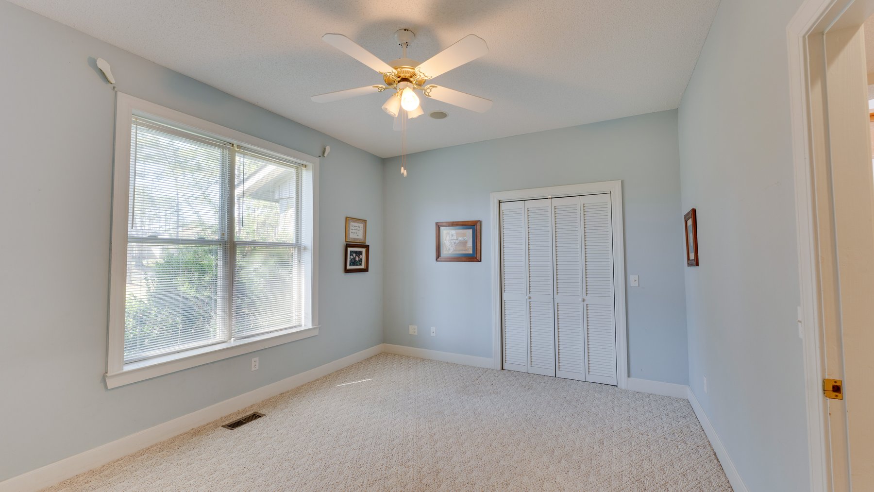 Image for Carolyn A. Peace Living Estate - Beautiful Stone-Faced Wood-Siding Ranch-Style Home