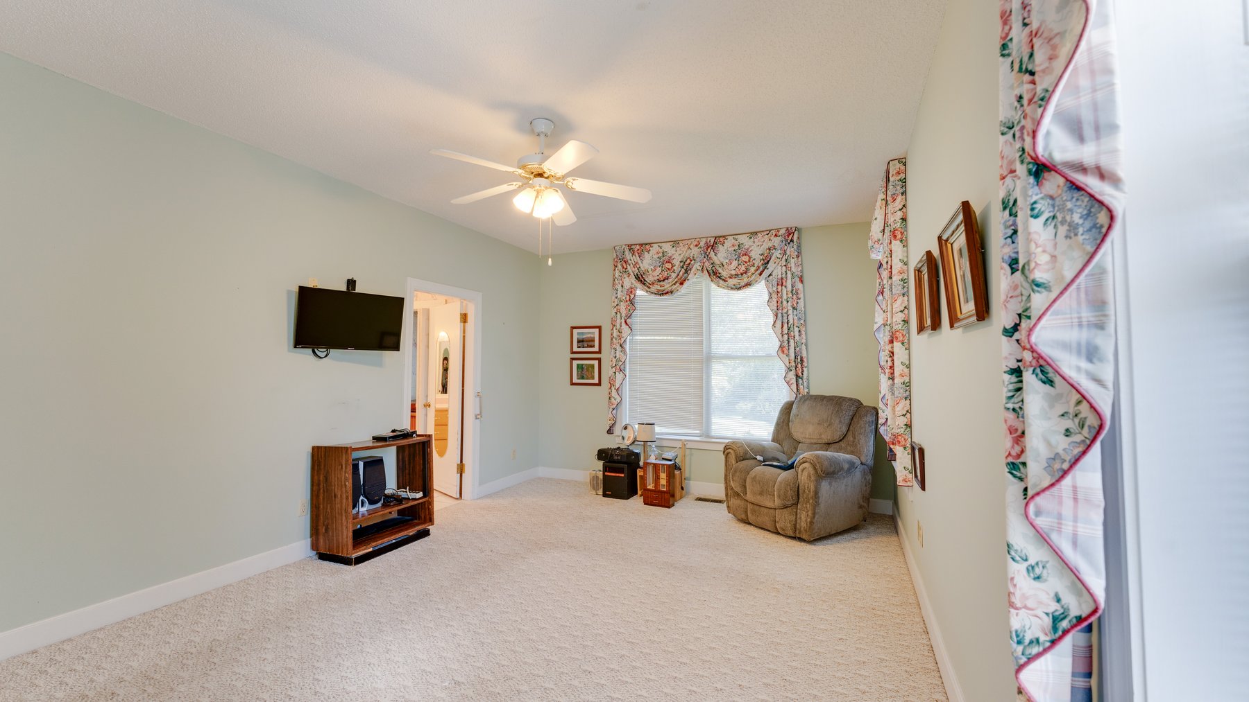 Image for Carolyn A. Peace Living Estate - Beautiful Stone-Faced Wood-Siding Ranch-Style Home