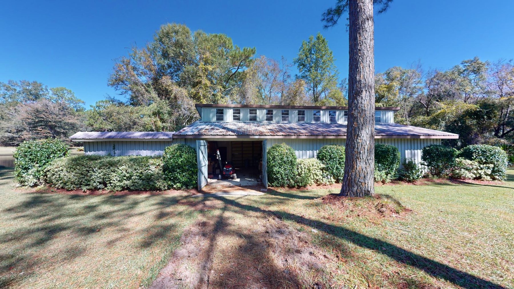 Image for Carolyn A. Peace Living Estate - Beautiful Stone-Faced Wood-Siding Ranch-Style Home