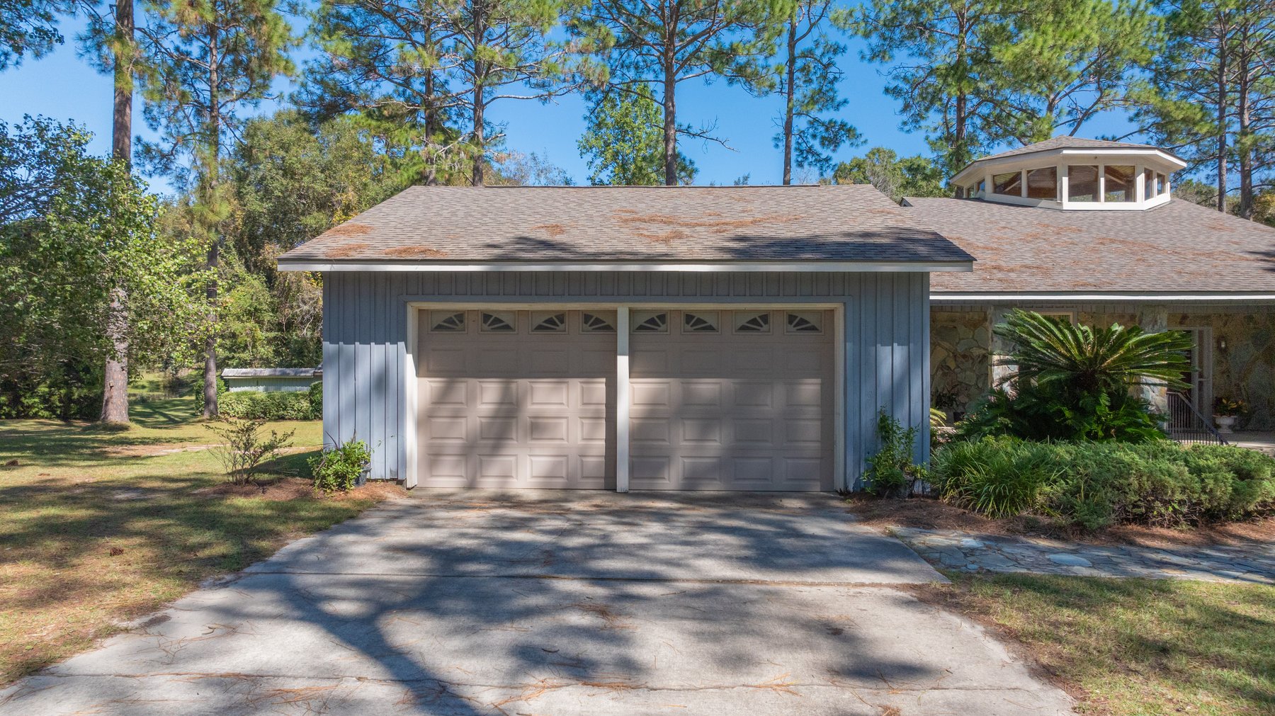 Image for Carolyn A. Peace Living Estate - Beautiful Stone-Faced Wood-Siding Ranch-Style Home