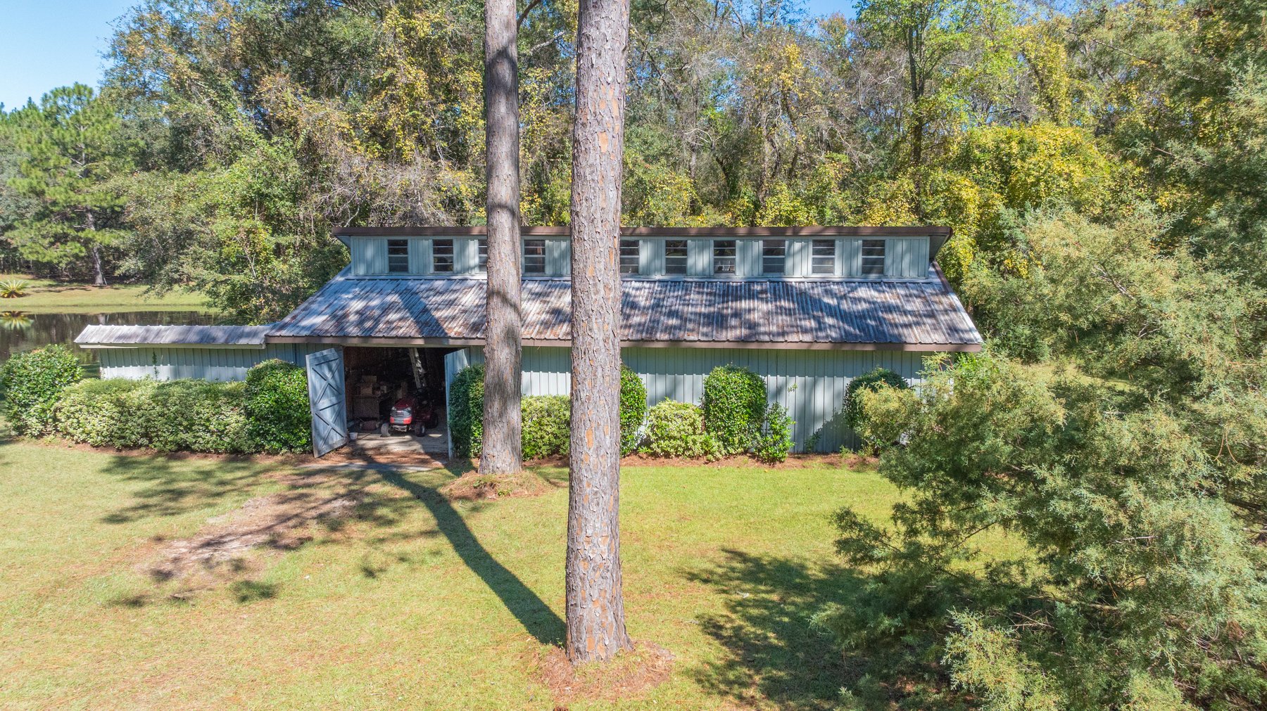 Image for Carolyn A. Peace Living Estate - Beautiful Stone-Faced Wood-Siding Ranch-Style Home