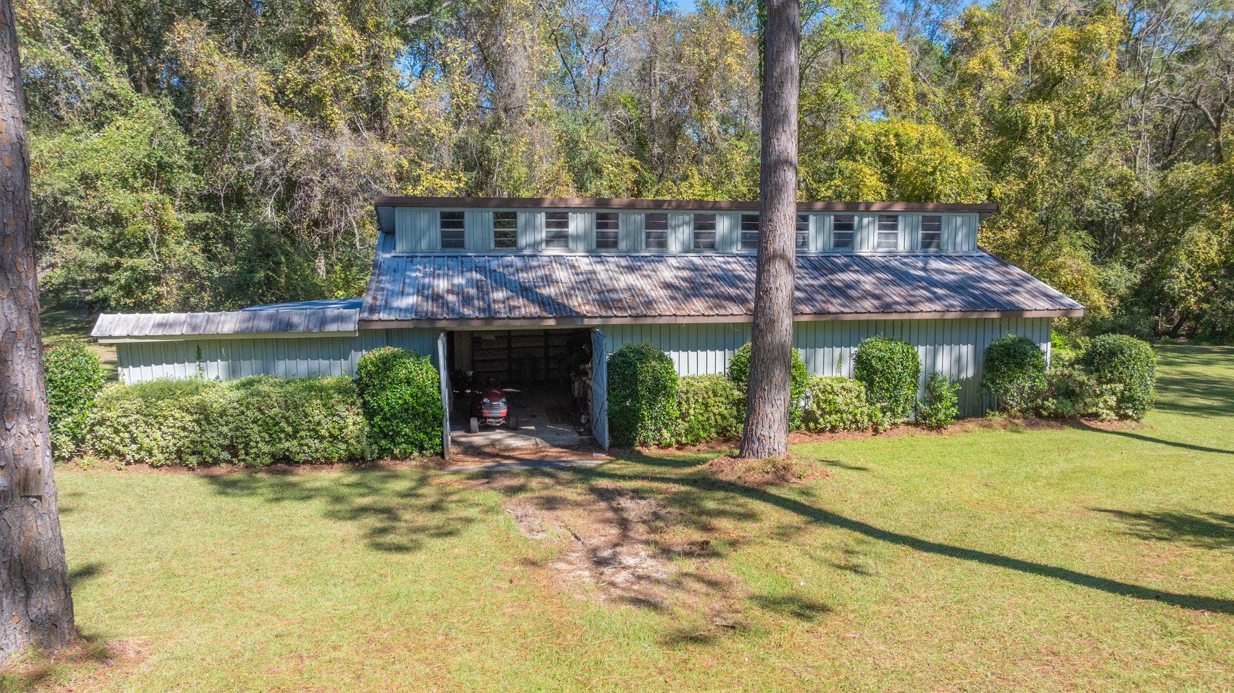 Image for Carolyn A. Peace Living Estate - Beautiful Stone-Faced Wood-Siding Ranch-Style Home