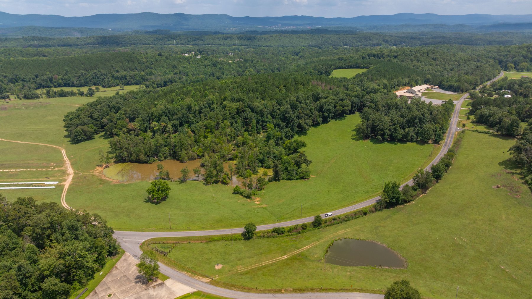 Image for Pleasant Valley Farms – 238+/- Total Acres - Residential Development Opportunity - Beautiful Brick Home & Improvements - Offered Divided & as a Whole