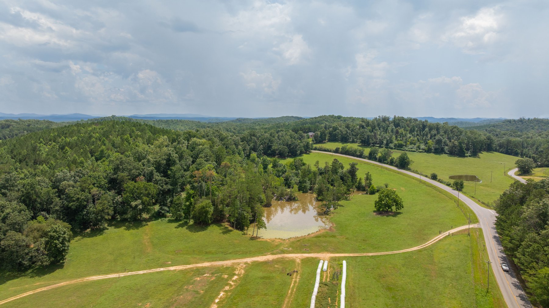 Image for Pleasant Valley Farms – 238+/- Total Acres - Residential Development Opportunity - Beautiful Brick Home & Improvements - Offered Divided & as a Whole