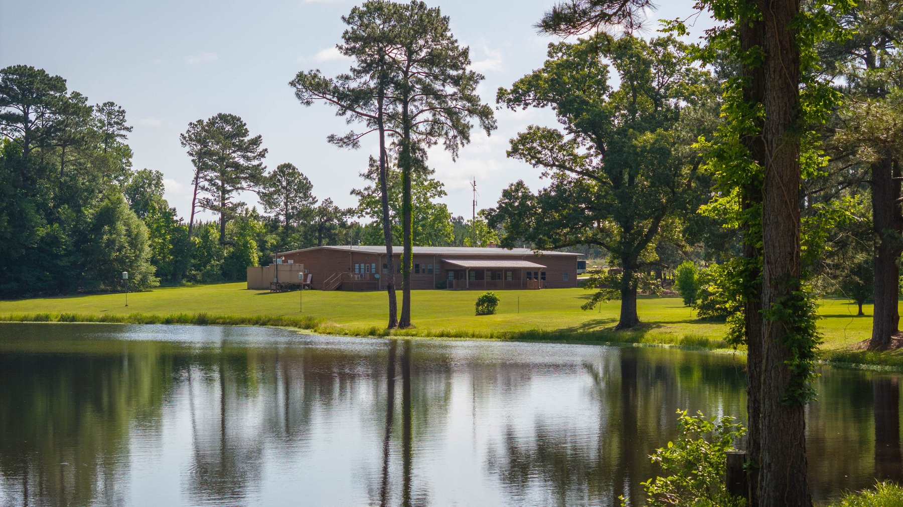 Image for 176+/- Acres - 6,546+/- SF Custom Lodge w/ Stocked Ponds & Food Plots - Mature Timber & Rocky Creek Frontage