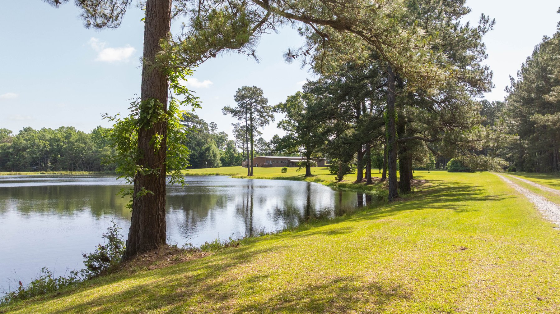 Image for 176+/- Acres - 6,546+/- SF Custom Lodge w/ Stocked Ponds & Food Plots - Mature Timber & Rocky Creek Frontage