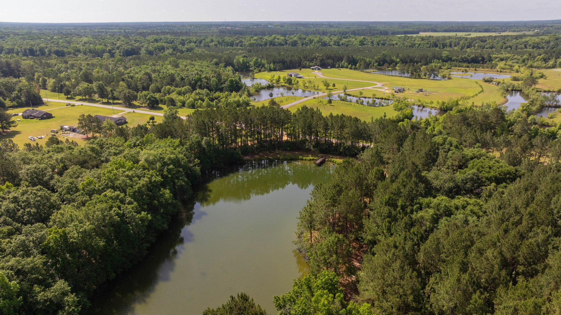 Image for 176+/- Acres - 6,546+/- SF Custom Lodge w/ Stocked Ponds & Food Plots - Mature Timber & Rocky Creek Frontage
