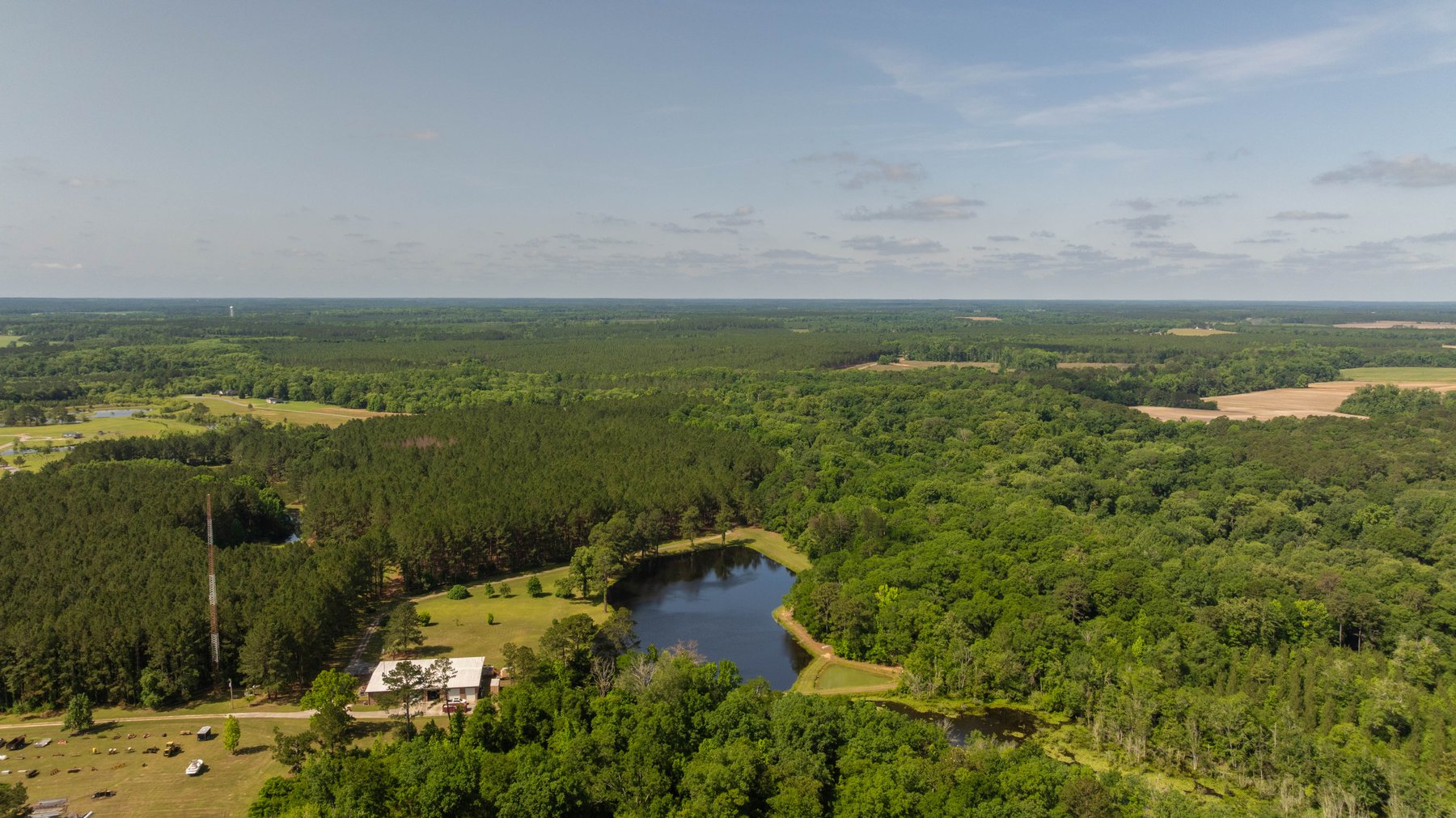 Image for 176+/- Acres - 6,546+/- SF Custom Lodge w/ Stocked Ponds & Food Plots - Mature Timber & Rocky Creek Frontage