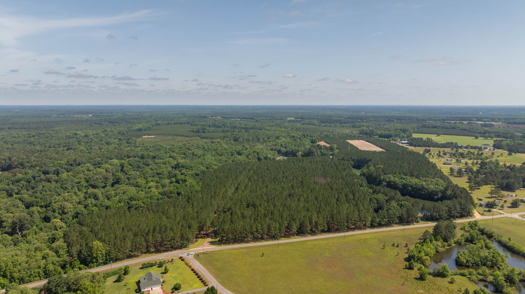 Image for 176+/- Acres - 6,546+/- SF Custom Lodge w/ Stocked Ponds & Food Plots - Mature Timber & Rocky Creek Frontage