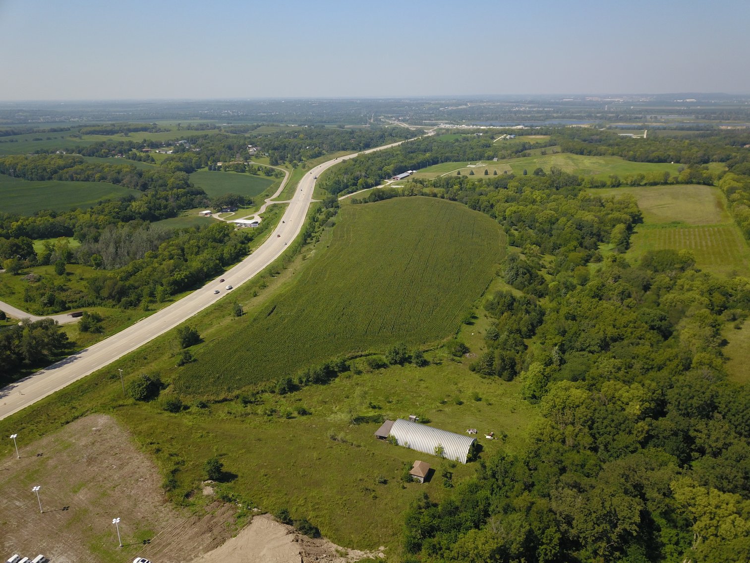 Image for IN PERSON/ONLINE HIGHLY VISIBLE HIGHWAY FRONTAGE DEVELOPMENT POTENTIAL FARMLAND AUCTION