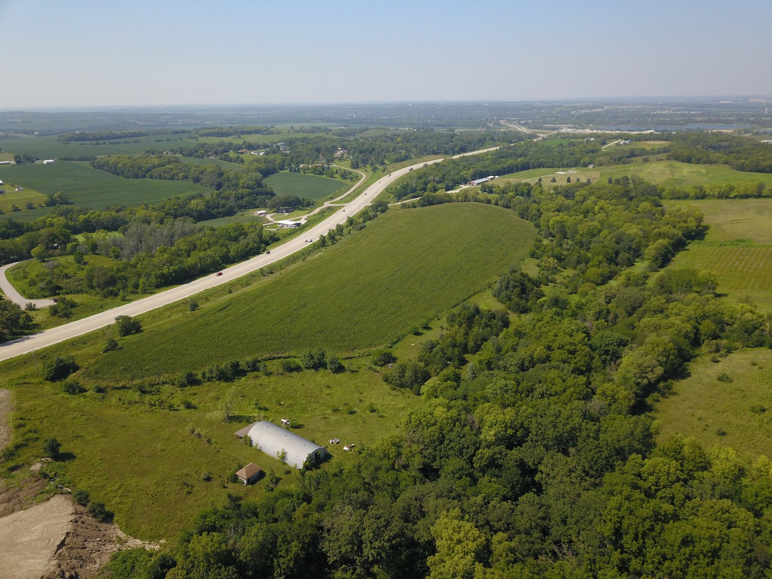 Image for IN PERSON/ONLINE HIGHLY VISIBLE HIGHWAY FRONTAGE DEVELOPMENT POTENTIAL FARMLAND AUCTION