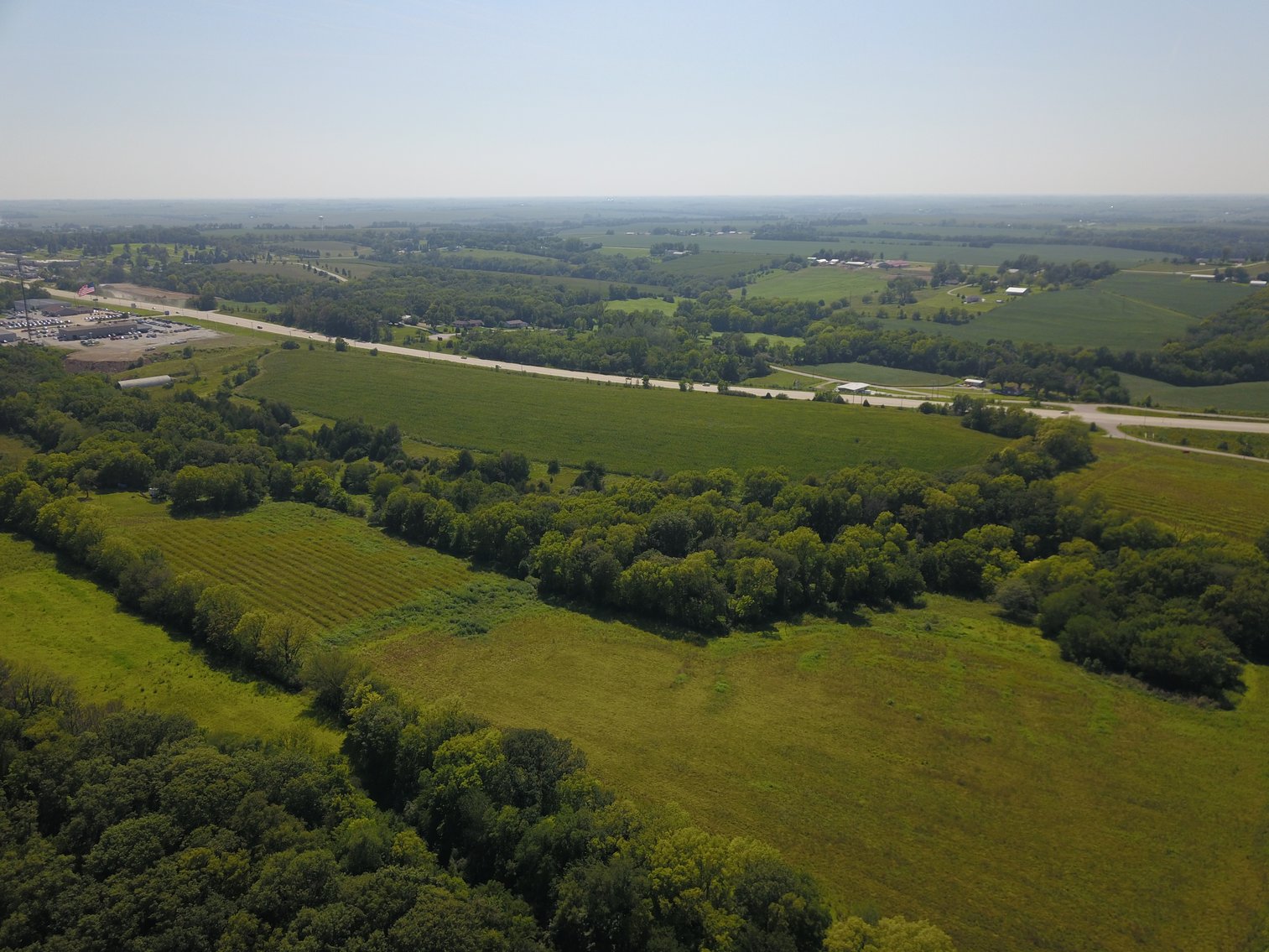 Image for IN PERSON/ONLINE HIGHLY VISIBLE HIGHWAY FRONTAGE DEVELOPMENT POTENTIAL FARMLAND AUCTION