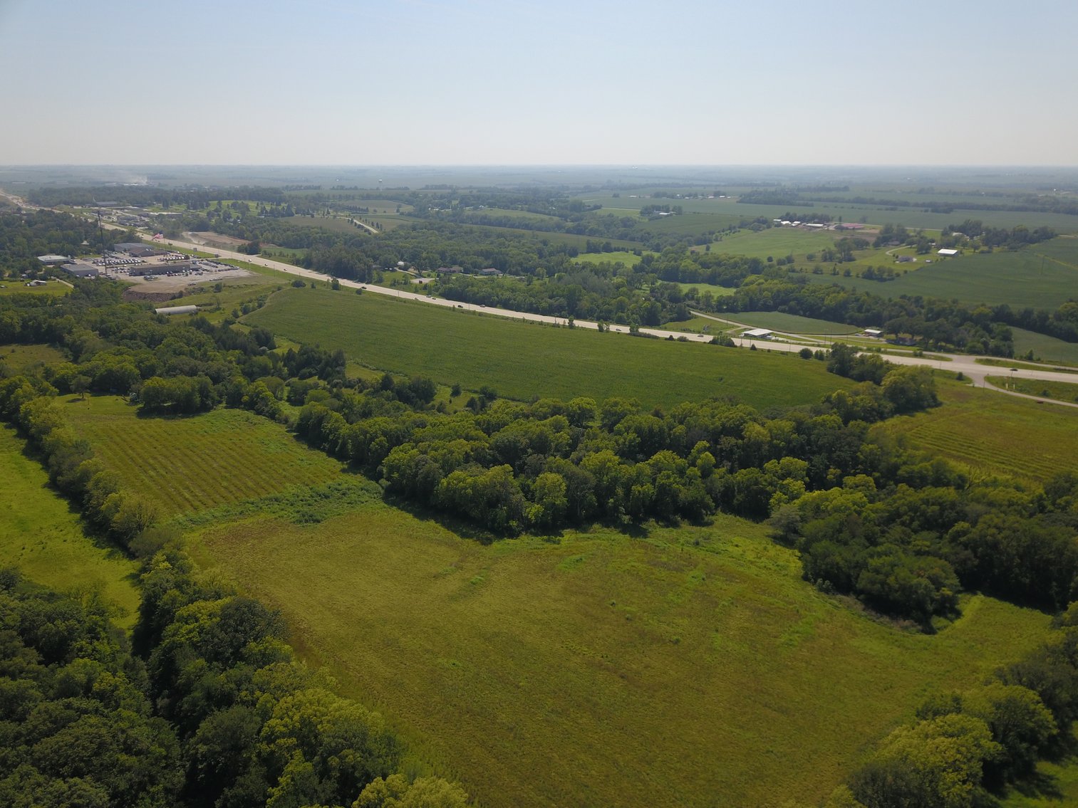 Image for IN PERSON/ONLINE HIGHLY VISIBLE HIGHWAY FRONTAGE DEVELOPMENT POTENTIAL FARMLAND AUCTION