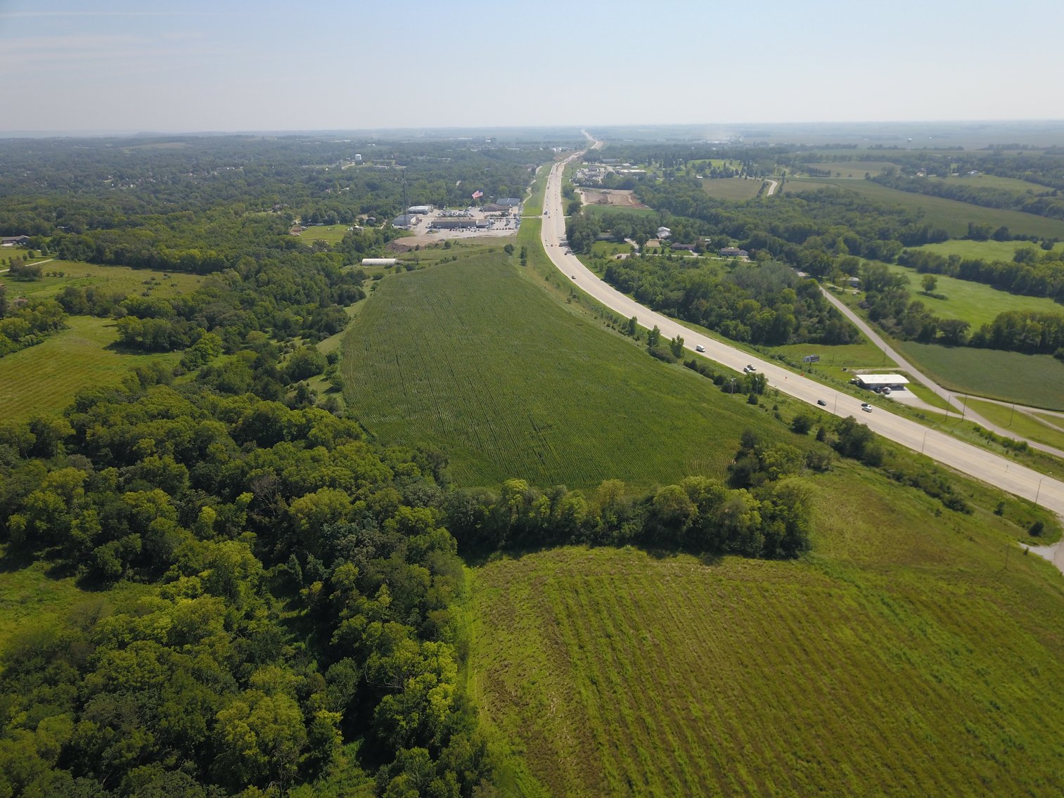 Image for IN PERSON/ONLINE HIGHLY VISIBLE HIGHWAY FRONTAGE DEVELOPMENT POTENTIAL FARMLAND AUCTION