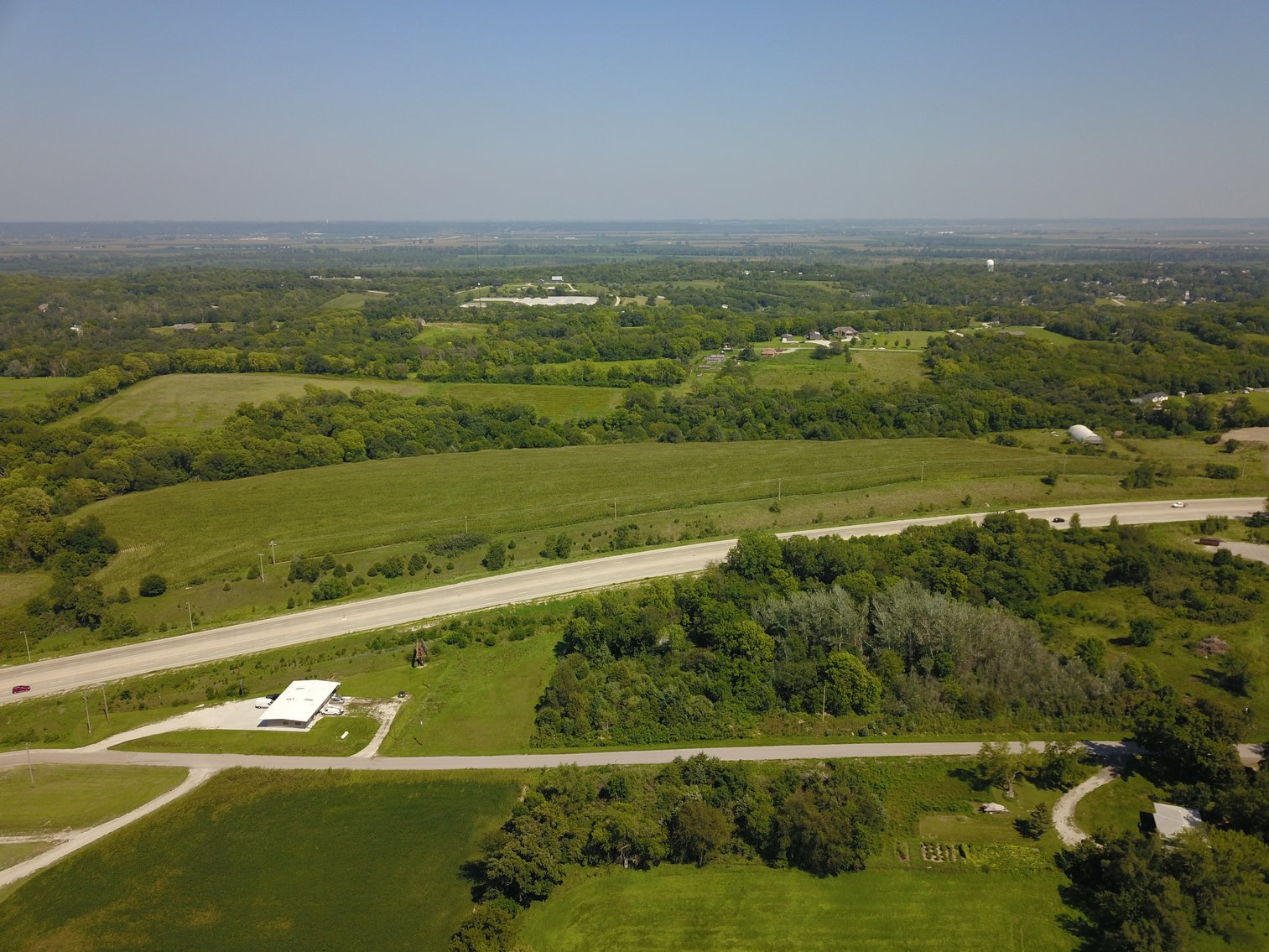 Image for IN PERSON/ONLINE HIGHLY VISIBLE HIGHWAY FRONTAGE DEVELOPMENT POTENTIAL FARMLAND AUCTION