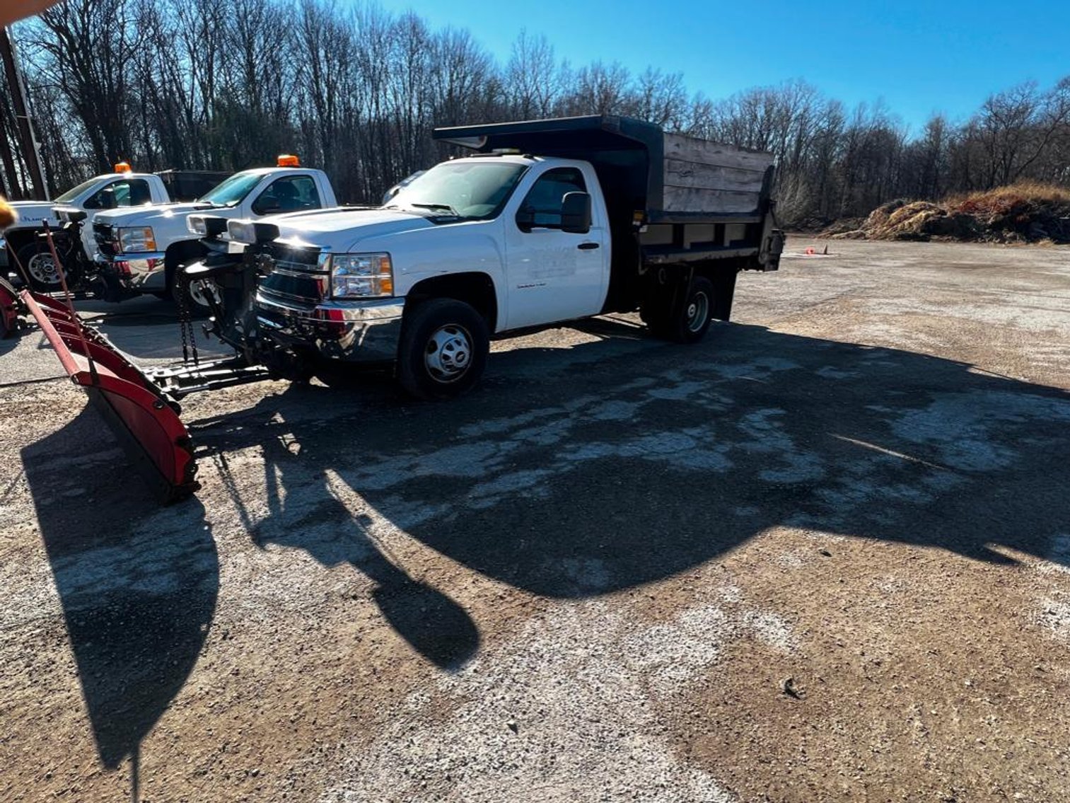 Image for TRUCKS WITH PLOWS AND MOWER ONLINE ONLY